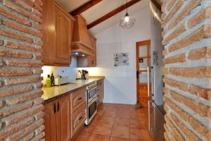 Una cocina o zona de cocina en La Perla Andaluza