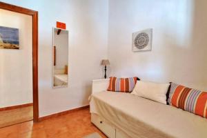Cama o camas de una habitación en La Perla Andaluza