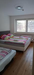 Ένα ή περισσότερα κρεβάτια σε δωμάτιο στο Brilliant Home Messe