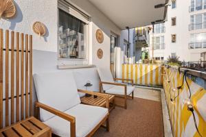 Ein Sitzbereich in der Unterkunft EDLER WOHNRAUM Luxuriöses Apartment mit Balkon, Boxspringbett, Kaffeevollautomat, Lift & Parkplatz