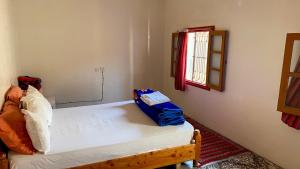 Voodi või voodid majutusasutuse Dar Relax Hostel, Gorges de Todra toas