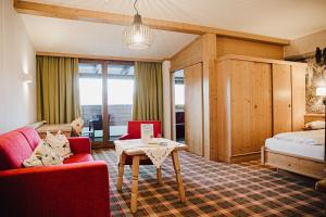 Posteľ alebo postele v izbe v ubytovaní Familiengut Hotel Burgstaller