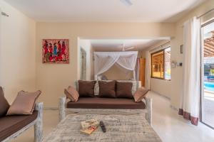 Area soggiorno di The Afters Boutique Hotel Diani