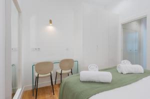 Ένα ή περισσότερα κρεβάτια σε δωμάτιο στο Arroyo 3 Apartments