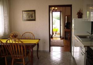 Kuchyň nebo kuchyňský kout v ubytování Apartment Dragica