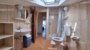 Kúpeľňa v ubytovaní Apartments Ankica + 31 fotografií