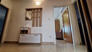 Kuchyň nebo kuchyňský kout v ubytování Apartments Ankica