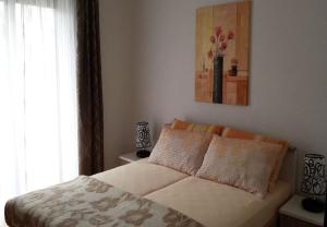 Postel nebo postele na pokoji v ubytování Apartment Dragica