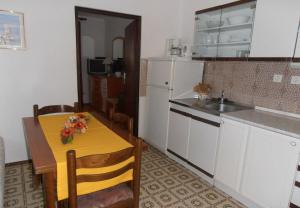 Kuchyň nebo kuchyňský kout v ubytování Apartment Dragica