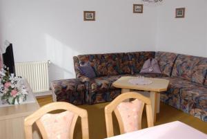Posezení v ubytování Pension & Appartement Fortin