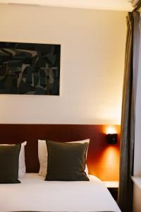 Postel nebo postele na pokoji v ubytování A Place Antwerp - Boutique Suites & Flats - Leeuwenstraat 20