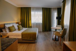 Postel nebo postele na pokoji v ubytování Prive Hotel Didim - Ultra All Inclusive