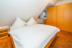 Postel nebo postele na pokoji v ubytování Sommerwind