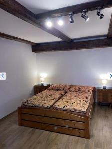 Postel nebo postele na pokoji v ubytování Areál Chmelařství Úštěk