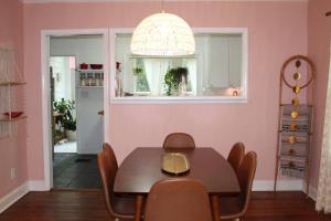 a dining room with a table and a window at Oldfield Escape in Decatur +39 photos