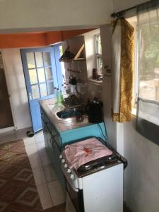 Η κουζίνα ή μικρή κουζίνα στο Butterfly Villa