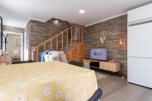 TV a/nebo společenská místnost v ubytování GuestReady - Tranquil Hideaway near Funchal + 21 fotografií