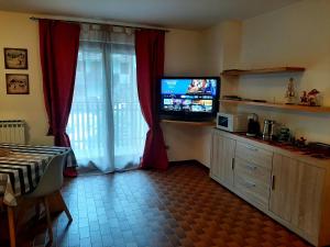 TV a/nebo společenská místnost v ubytování CIVICO 43 Interno 6