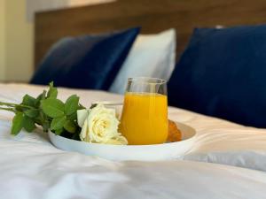 Postel nebo postele na pokoji v ubytování Green Hotel Tskaltubo