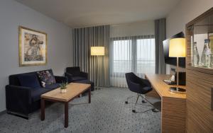 TV a/nebo společenská místnost v ubytování Maritim Hotel Darmstadt