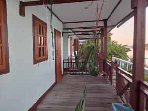 Balkón nebo terasa v ubytování Sunset bar bungalows