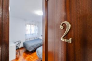 Postel nebo postele na pokoji v ubytování La Ruta de Carlos V - VUT