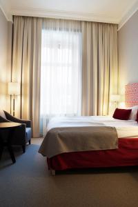 Letto o letti in una camera di Elite Stora Hotellet Linköping