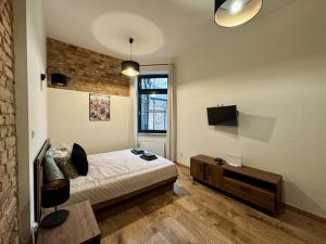 Μια τηλεόραση ή/και κέντρο ψυχαγωγίας στο Saint Martin Apartment