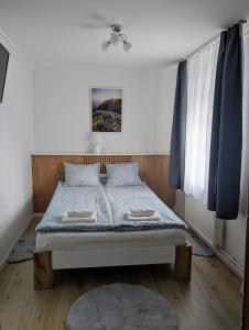 Postel nebo postele na pokoji v ubytování Haus im Hochtal
