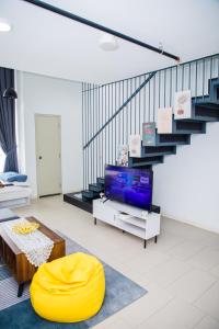 Χώρος καθιστικού στο B & B Cozy Duplex Tamarind Square Cyberjaya