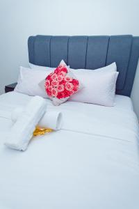 Postel nebo postele na pokoji v ubytování B & B Cozy Duplex Tamarind Square Cyberjaya + 25 fotografií