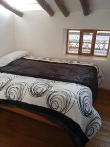 Casa Cusco guest house客房内的一张或多张床位