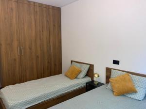 Ένα ή περισσότερα κρεβάτια σε δωμάτιο στο Apartman Glečer Vila Bela Reka
