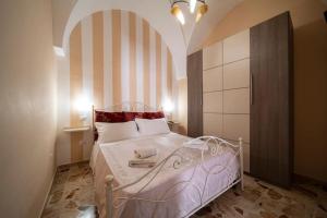 Postel nebo postele na pokoji v ubytování Casa Vilù