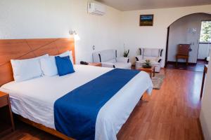 Cama o camas de una habitación en Hotel Del Angel, Apizaco