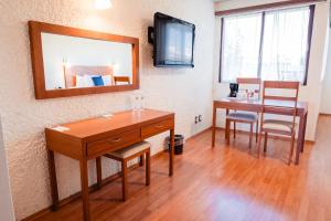 Una televisión o centro de entretenimiento en Hotel Del Angel, Apizaco
