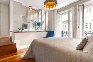 Uma cama ou camas num quarto em Luxury Apartment In Cardosas