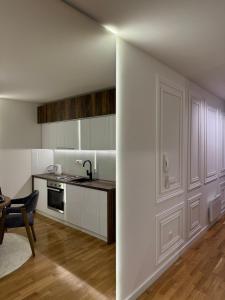 Kuchyň nebo kuchyňský kout v ubytování Rest Apartman, Bjelašnica