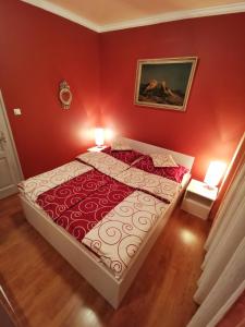 Posteľ alebo postele v izbe v ubytovaní Boros Vendégház Eger