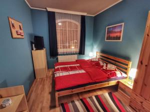 Posteľ alebo postele v izbe v ubytovaní Boros Vendégház Eger