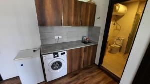 Nhà bếp/bếp nhỏ tại Apartment in Bakuriani