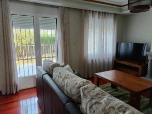 Телевизор и/или развлекательный центр в La Casa de Ana