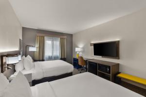 Postel nebo postele na pokoji v ubytování Comfort Inn & Suites Austin North Loop