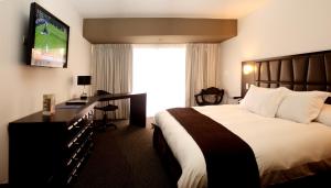 Телевизор и/или развлекательный центр в Wyndham Costa del Sol Trujillo