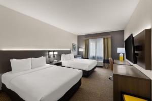 Postel nebo postele na pokoji v ubytování Comfort Inn & Suites Austin North Loop