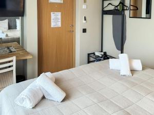 Ένα ή περισσότερα κρεβάτια σε δωμάτιο στο Small Double Room at Hanohus Hotel