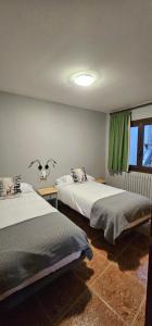 Rúm í herbergi á Apartaments Bonet