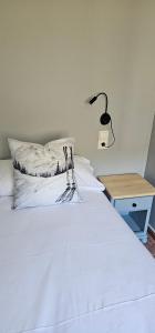 Rúm í herbergi á Apartaments Bonet