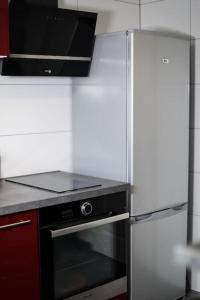 Kuchyň nebo kuchyňský kout v ubytování T2 cosy entre calme et proximité