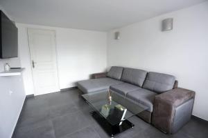 Posezení v ubytování T2 cosy entre calme et proximité